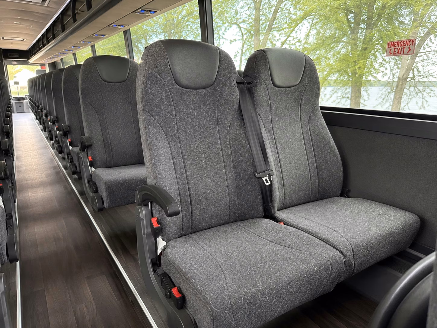 how bus type changes charter bus rental prices in rochester hills michigan